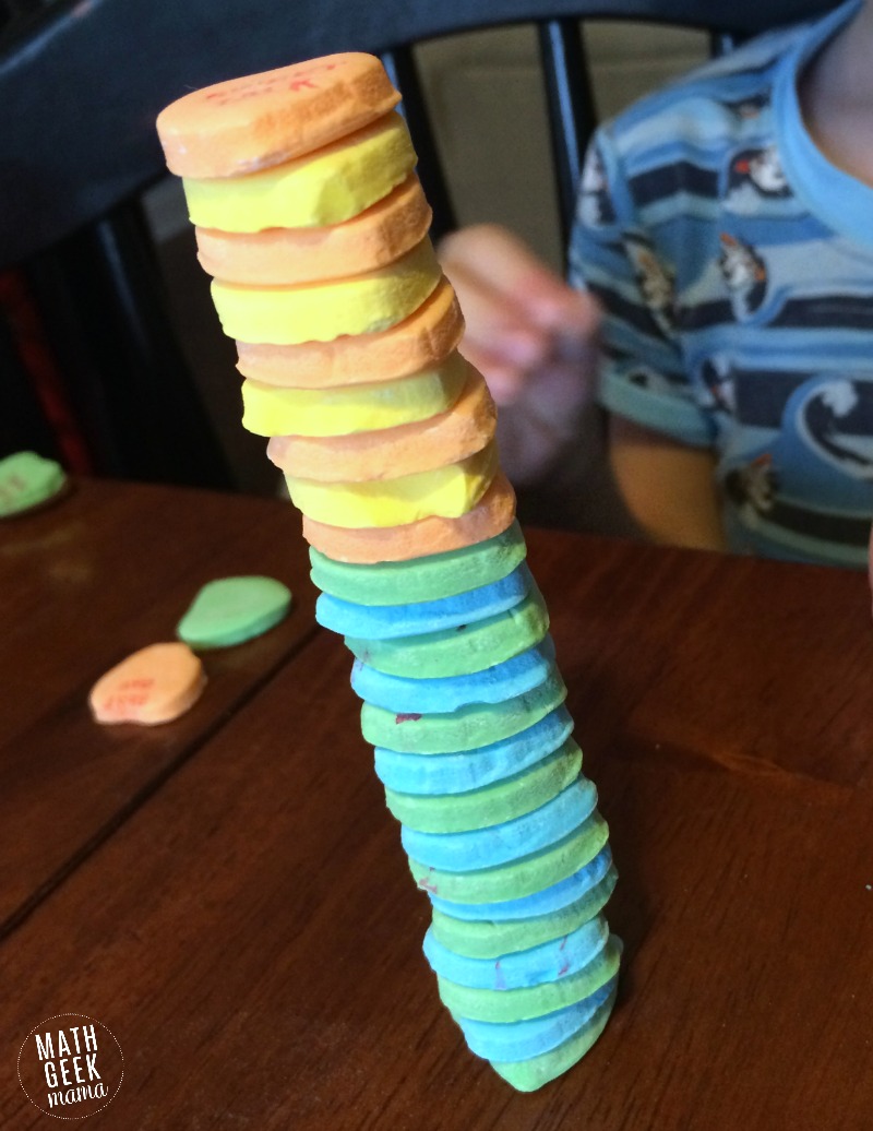 This simple challenge lets kids explore engineering and math, as well as work on fine motor skills! All you need is a bag of conversation hearts for hours of math fun and learning!