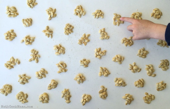 Estimating pumpkin seeds is a great hands-on math activity that really gets kids thinking about estimation and skip counting! Plus it's a great combination of math and literacy!