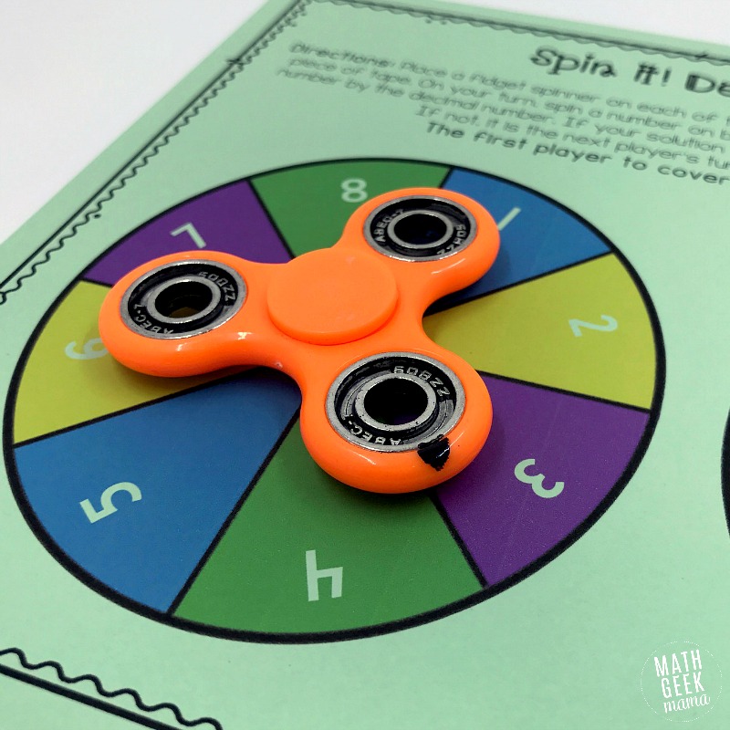 This game provides fun practice with decimals and is great for kids who love to use their fidget spinner! With this easy print and play game, kids will work on multiplying and dividing whole numbers with decimals. Plus, with blank game boards you can create even more variations!